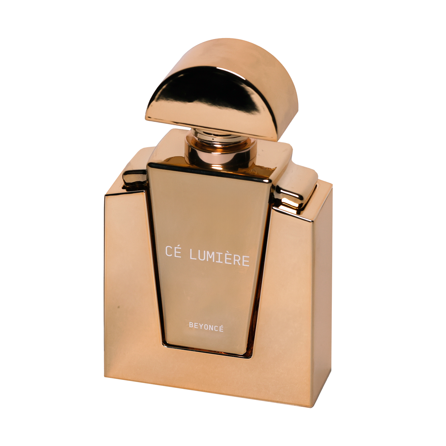 Beyoncé Cé Lumière perfume bottle in gold packaging on black background
