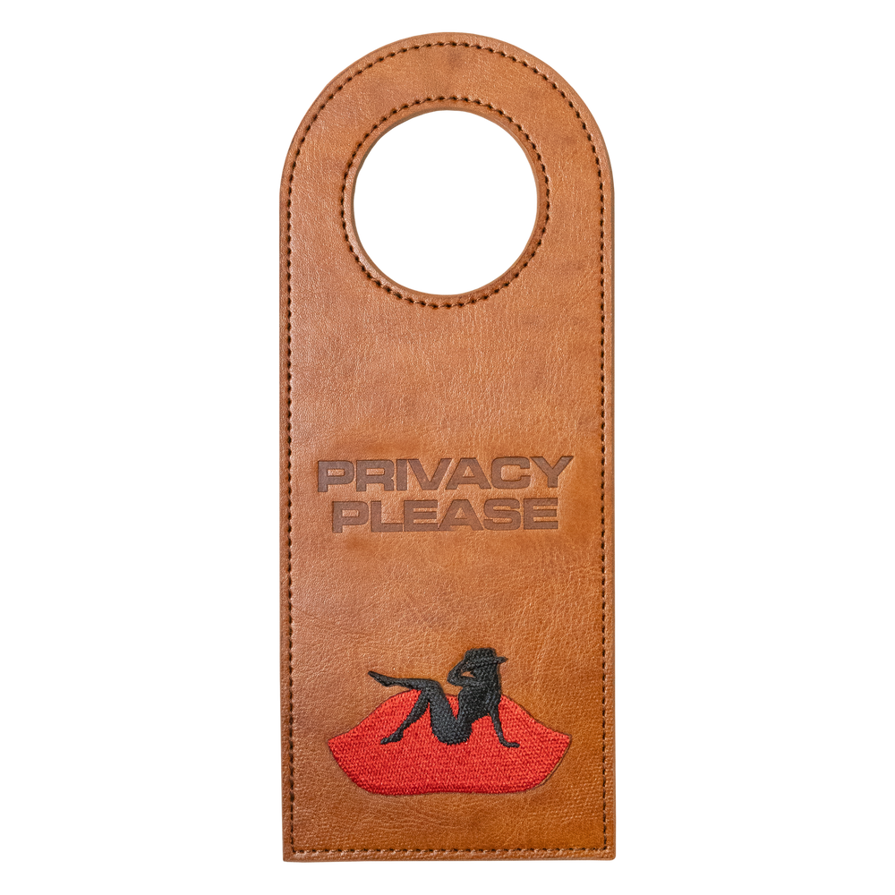 Tan Beyoncé merch Privacy Please door tag front view with red lips and black silhouette graphic
