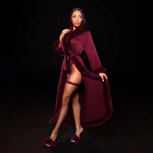 Cherry wine Beyoncé merch Renaissance satin robe lifestyle view with plush trim and elegant drape
