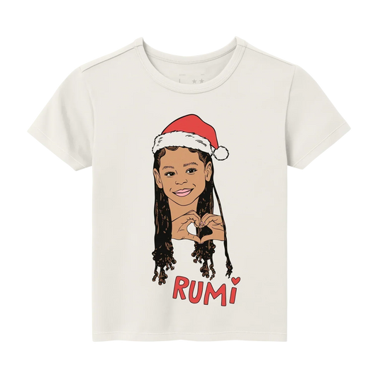 Beyoncé Rumi youth tee front view with holiday portrait graphic and red Rumi lettering