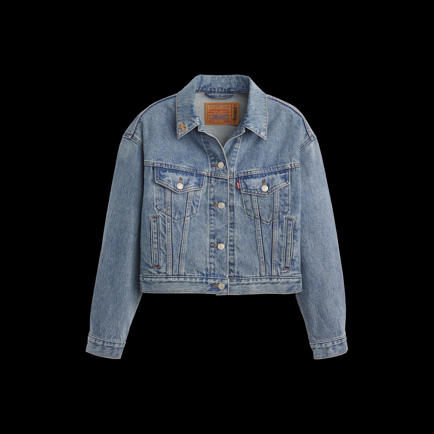 Beyoncé x Levi’s 90s shrunken trucker jacket front in authentic light wash denim with cropped vintage western-inspired fit